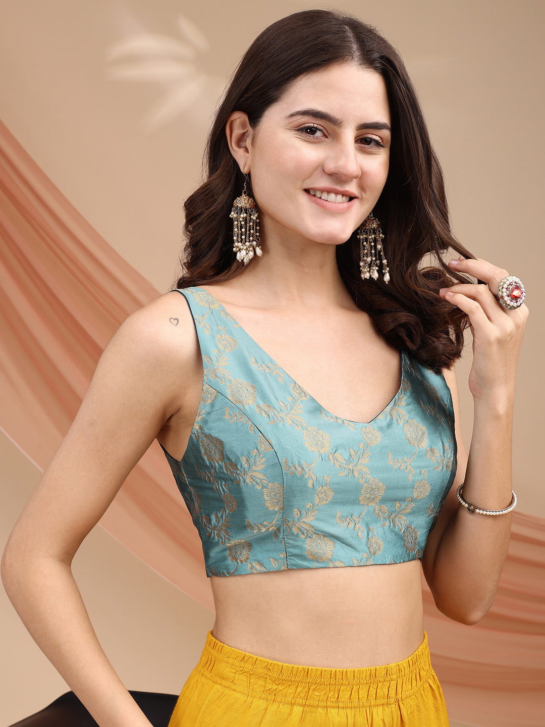 Blue colour brocade sleeveless blouse